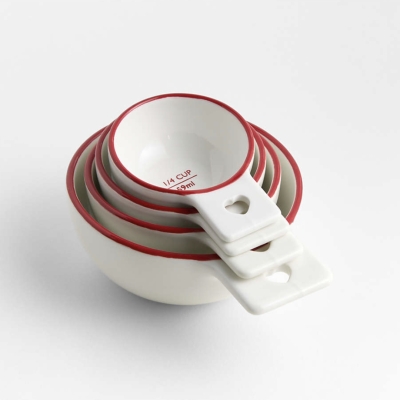 Image of product Red Rim Heart Handle Ceramic Measuring Cups, Set of 4 by Crate and Barrel