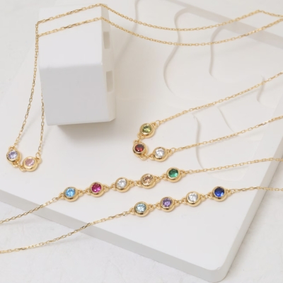 Image of product Personalized Family Birthstone Round Necklace by Style Diamond